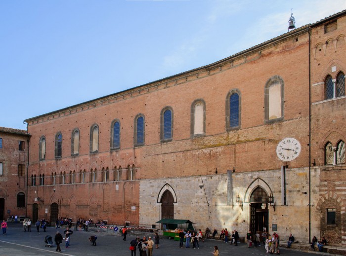 Santa Maria della Scala Siena - exterior across from the Duomo | Photo flickr user David P, creative commons