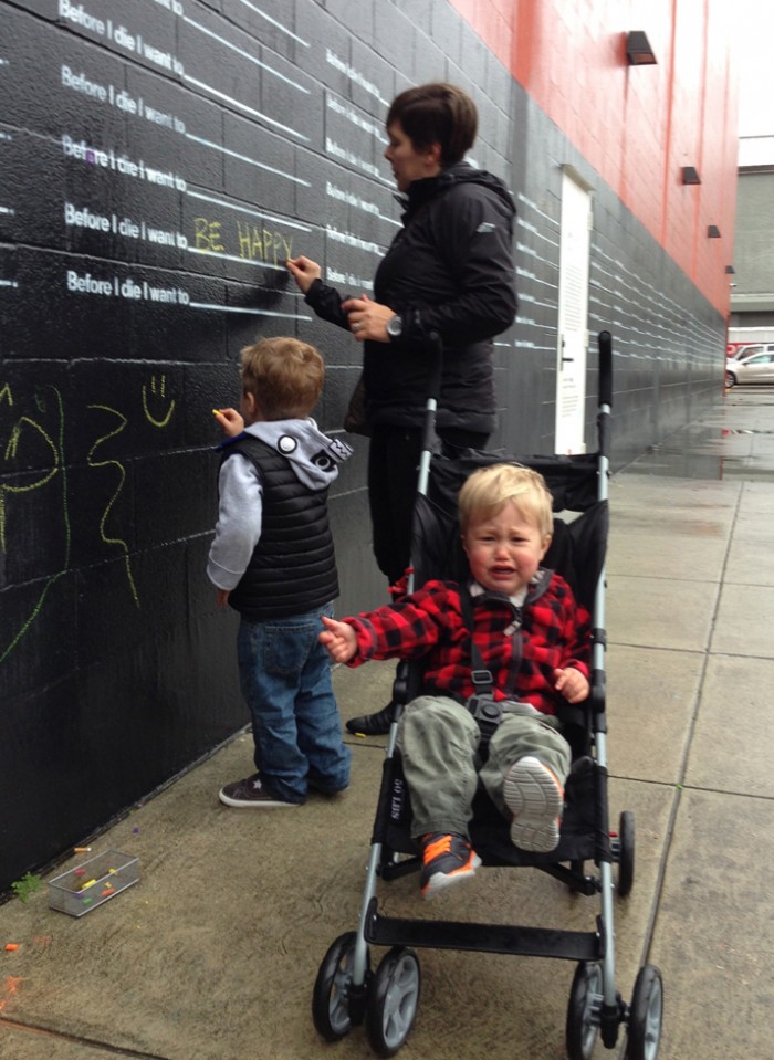 Karen and her kids, public art by Candy Chang, “Before I Die” in New Orleans