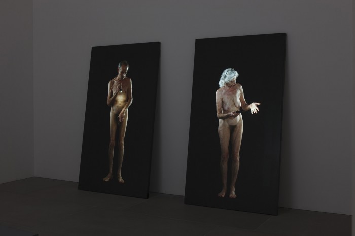 Bill Viola Man Searching for Immortality/Woman Searching for Eternity 2013, 18'54''. Video installation. Color High-Definition video diptych projected on large vertical slabs of black granite leaning on wall Performers: Luis Accinelli, Penelope Safranek 227 x 128 x 5 cm each. Courtesy Bill Viola Studio and Blain Southern, London